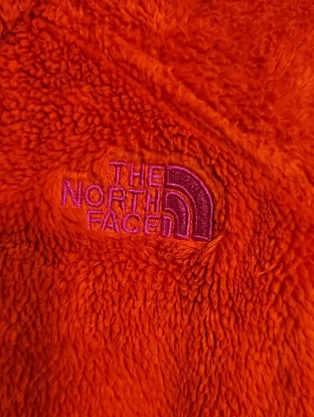 The North Face Girl's Bright Orange Plush Full-Zip Jacket with Purple Accents